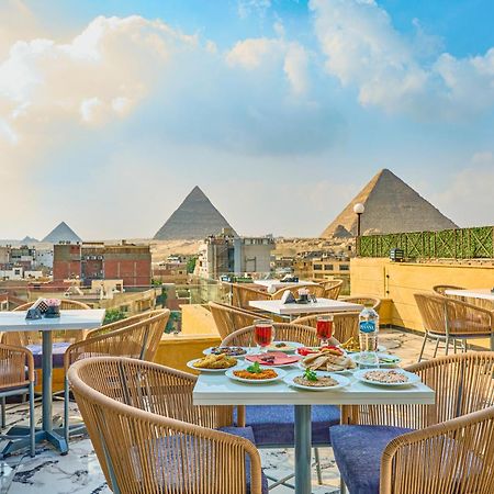 Hotel Cleopatra Tower Pyramid View Kafret el-Gabal Exterior foto